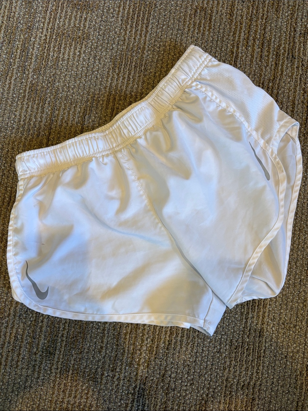Nike Women's White Athletic Shorts with Gray Swoosh
